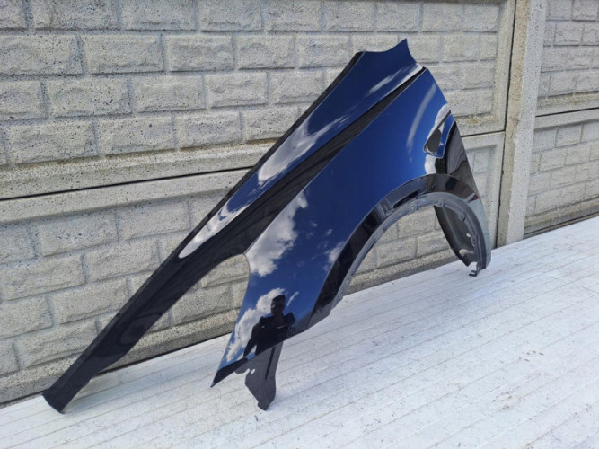 TESLA Y MODEL Y BŁOTNIK PRZEDNI LEWY - (15492907583)