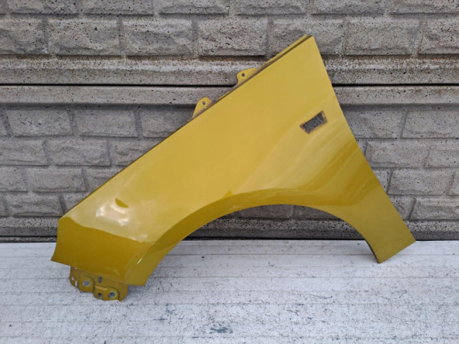 OPEL ADAM BŁOTNIK PRZEDNI LEWY - (15535624460)