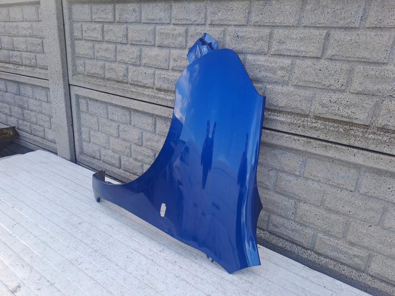 NISSAN MICRA K13 LIFT 13-18 BŁOTNIK PRZEDNI LEWY - (15592221815)