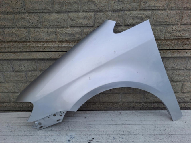 VW TOURAN LIFT BŁOTNIK LEWY 2007-2010 - (15685307221)