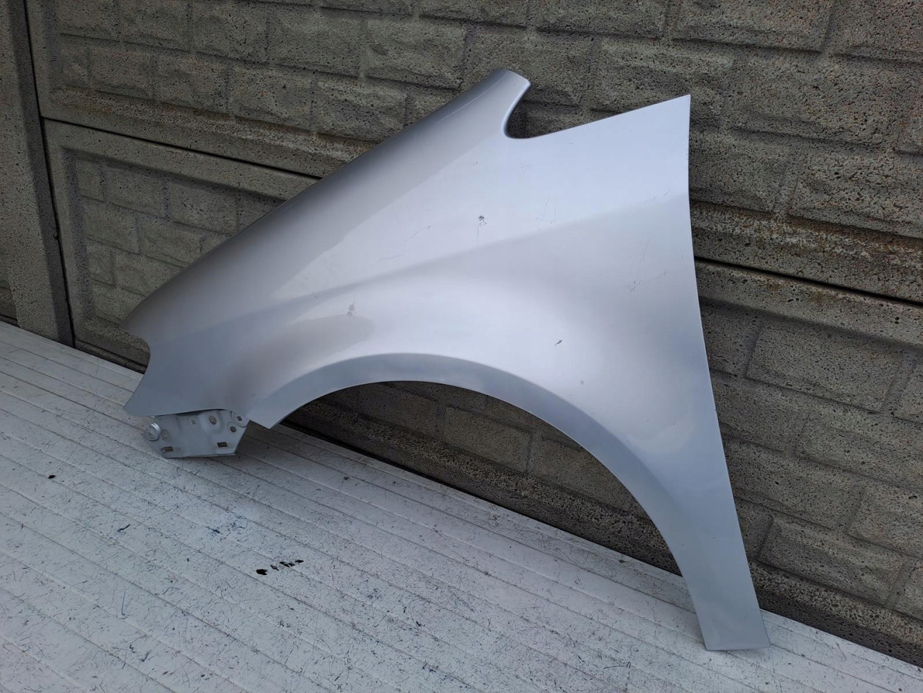 VW TOURAN LIFT BŁOTNIK LEWY 2007-2010 - (15685307221)