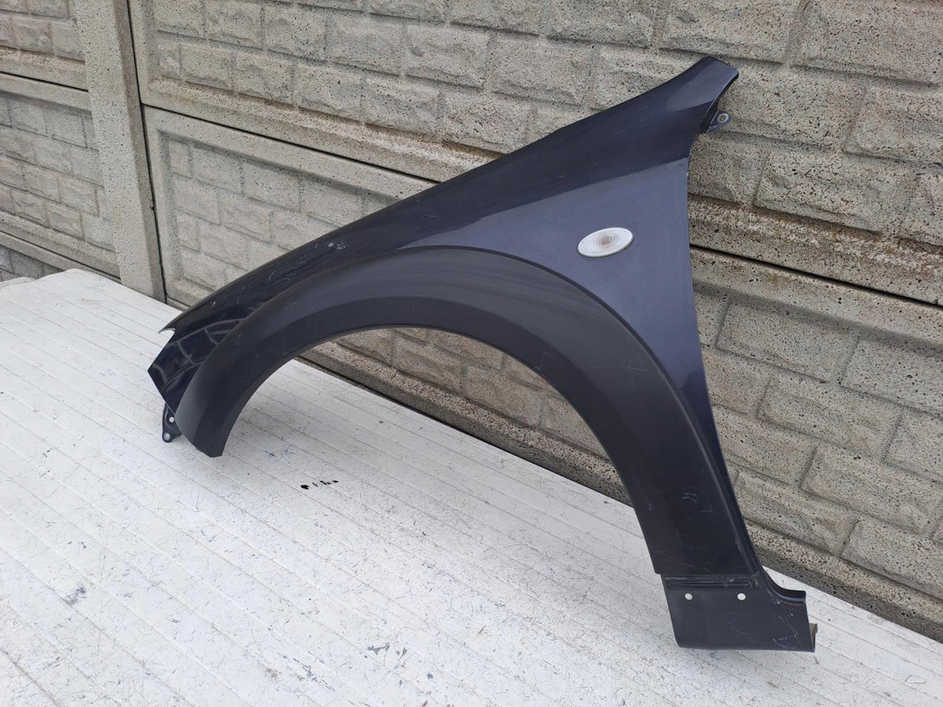 SUBARU IMPREZA XV GH BŁOTNIK PRZEDNI LEWY - (15685555996)