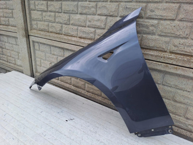 TESLA MODEL S BŁOTNIK LEWY PRZEDNI - (15729488675)
