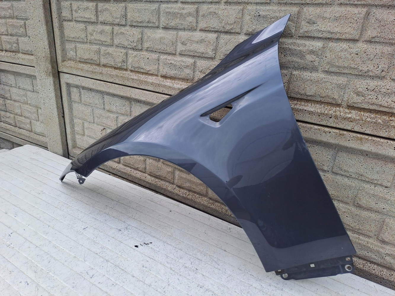 TESLA MODEL S BŁOTNIK LEWY PRZEDNI - (15729488675)