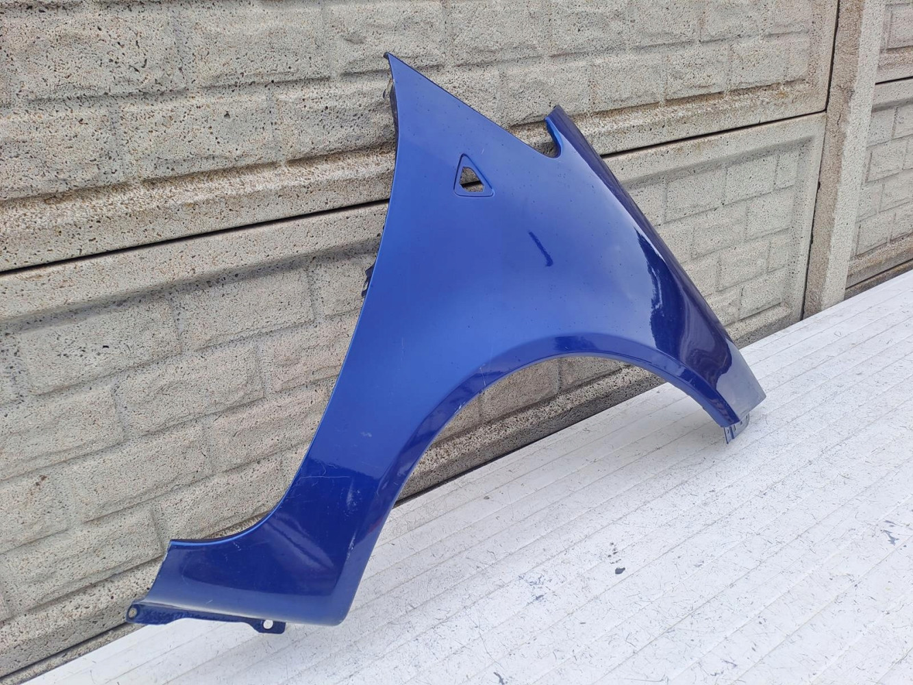 MITSUBISHI COLT 3D 03-08 BŁOTNIK PRZEDNI PRAWY - (15779752238)