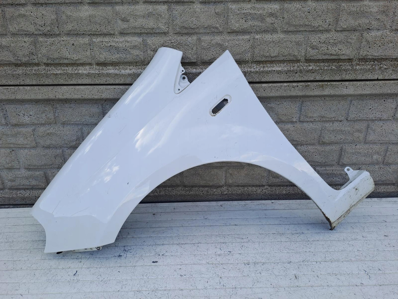 FIAT GRANDE PUNTO EVO 05-17 BŁOTNIK LEWY - (15838695112)