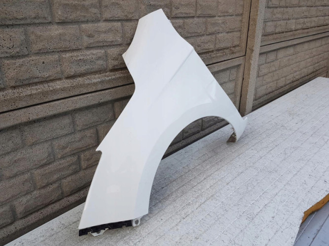 HYUNDAI I20 LIFT 12- BŁOTNIK PRZEDNI LEWY