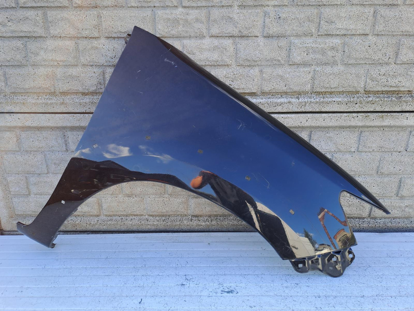 TOYOTA HILUX LIFT 2012-2015 BŁOTNIK PRZEDNI PRAWY - (15910176768)