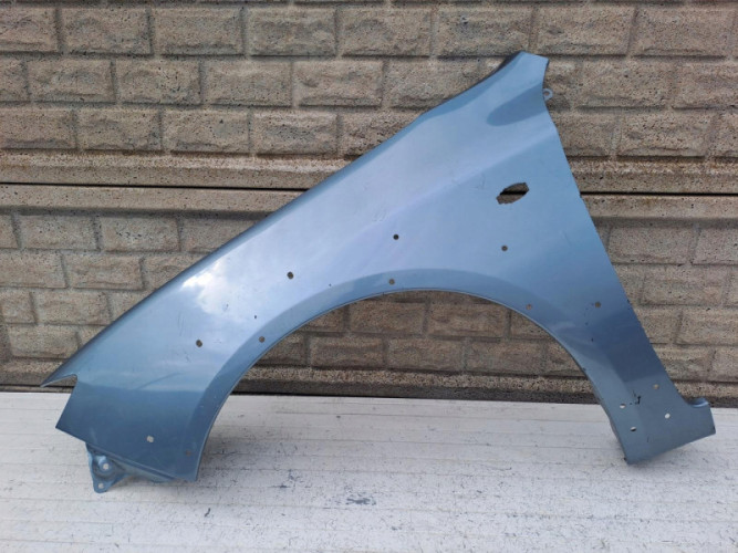 SUBARU IMPREZA XV GH BŁOTNIK PRZEDNI LEWY - (15982466499)