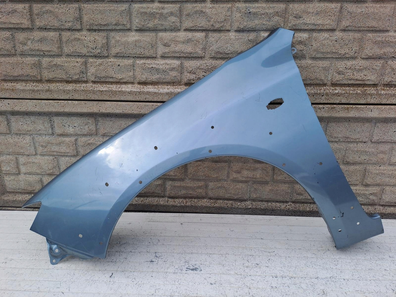 SUBARU IMPREZA XV GH BŁOTNIK PRZEDNI LEWY - (15982466499)