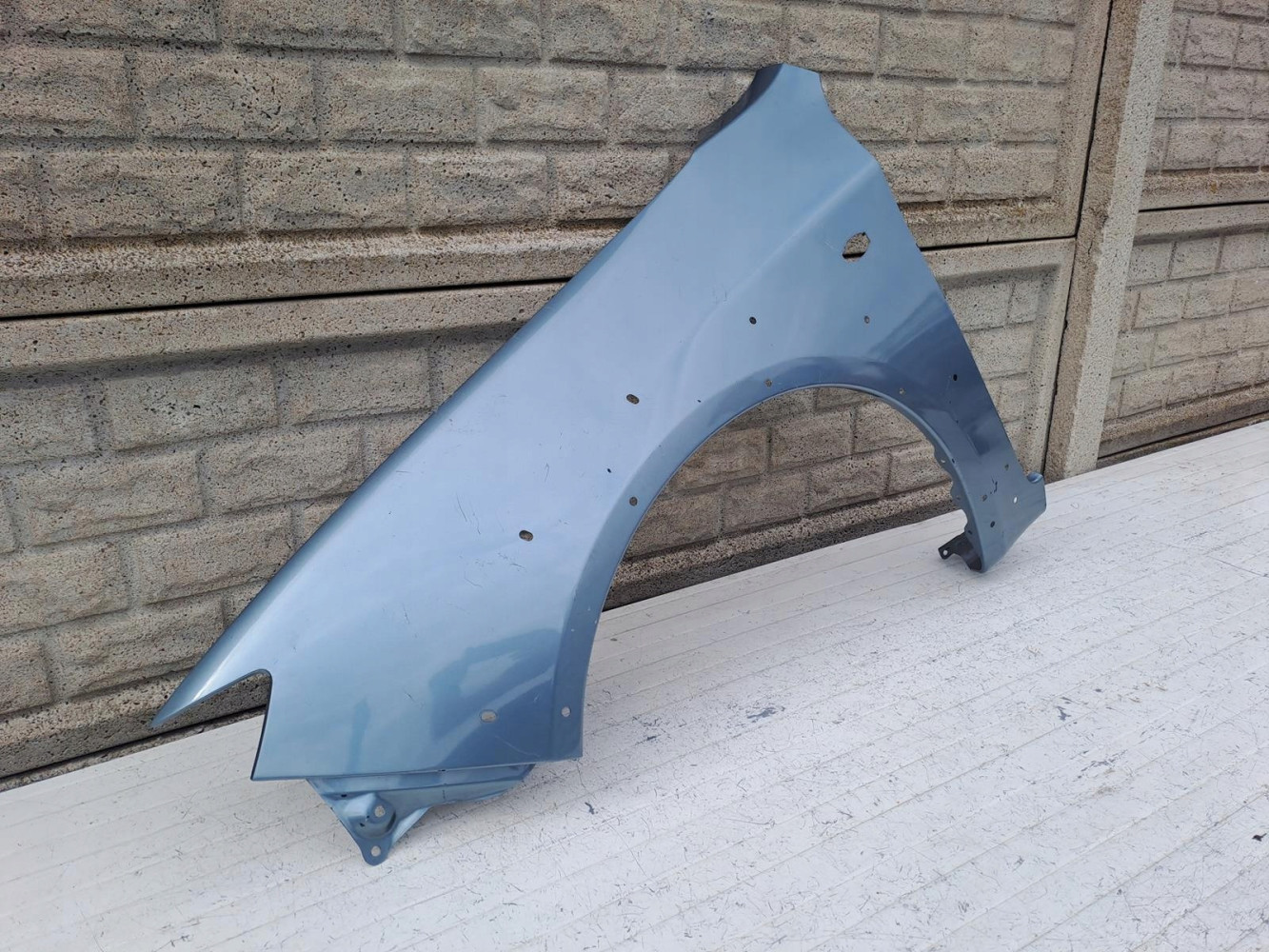 SUBARU IMPREZA XV GH BŁOTNIK PRZEDNI LEWY - (15982466499)