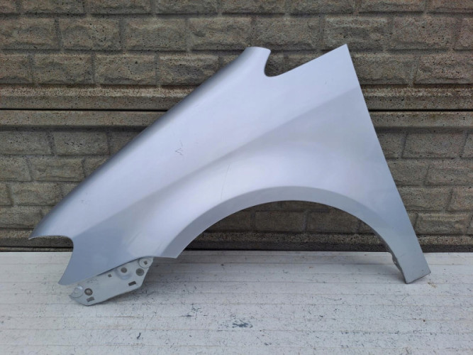 VW TOURAN LIFT BŁOTNIK LEWY 2007-2010 - (15983031015)