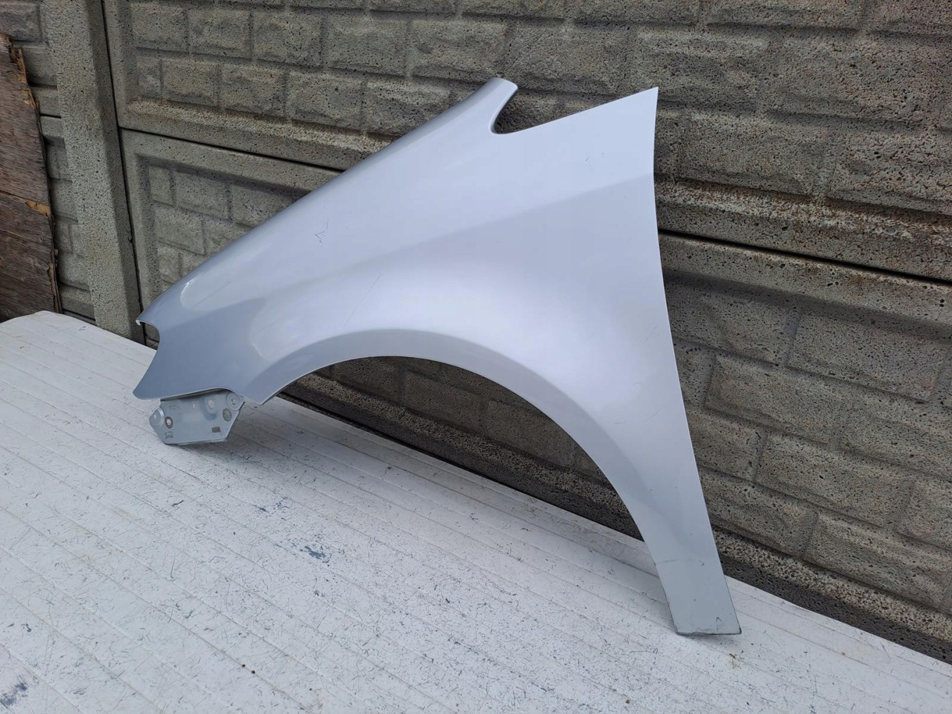 VW TOURAN LIFT BŁOTNIK LEWY 2007-2010 - (15983031015)