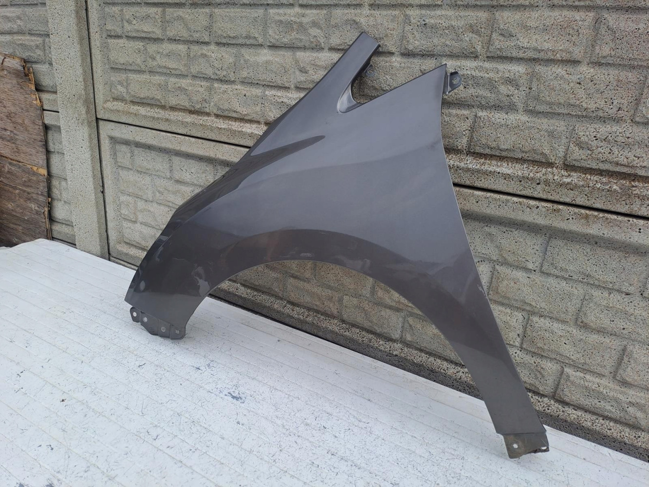 TOYOTA VERSO LIFT BŁOTNIK PRZEDNI LEWY - (16034419659)