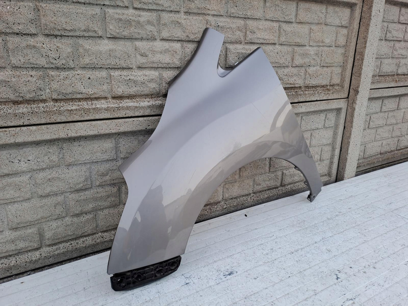 TOYOTA VERSO LIFT BŁOTNIK PRZEDNI LEWY - (16107854369)