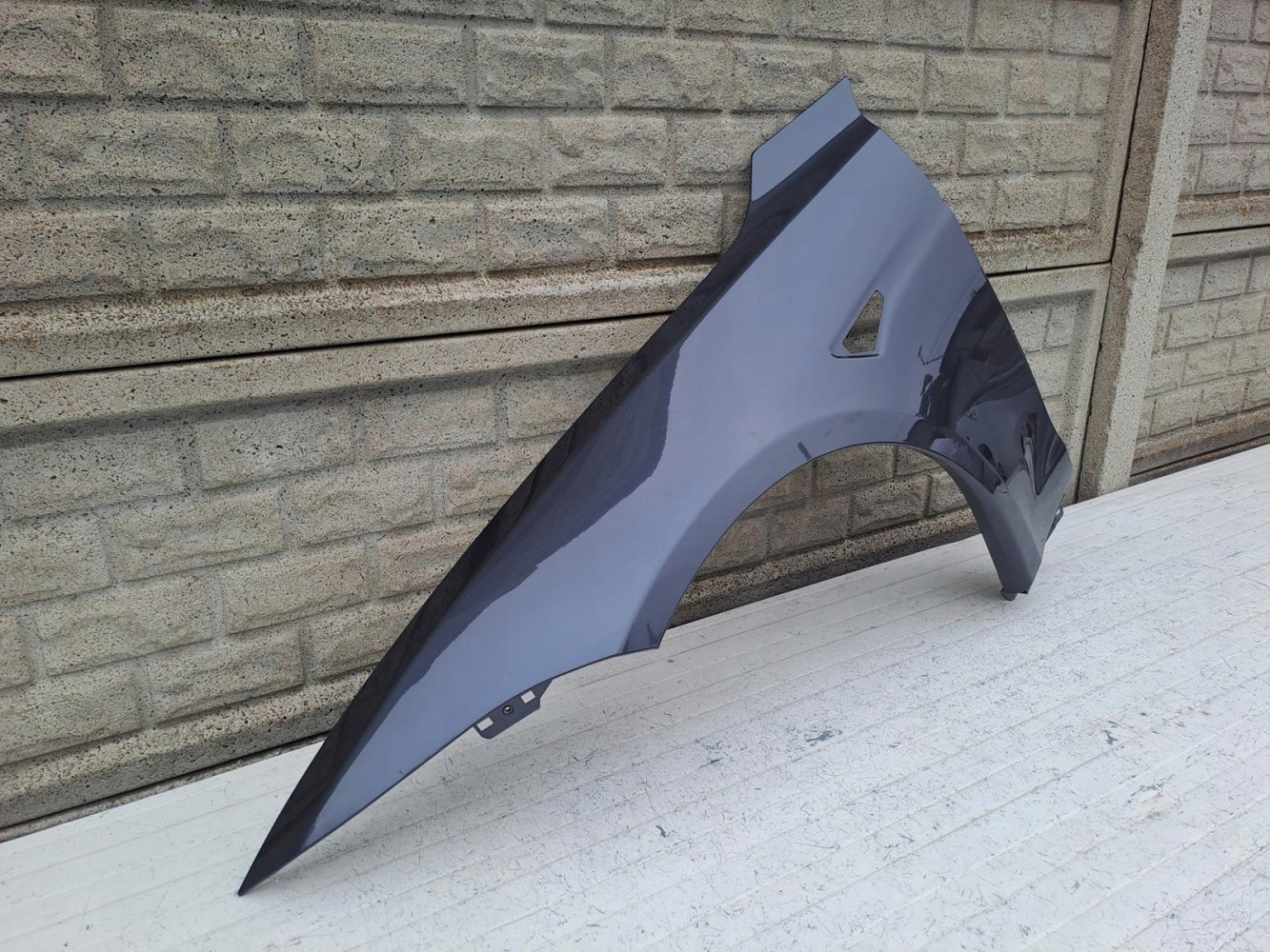 TESLA MODEL S PLAID BŁOTNIK LEWY PRZEDNI - (16153931425)