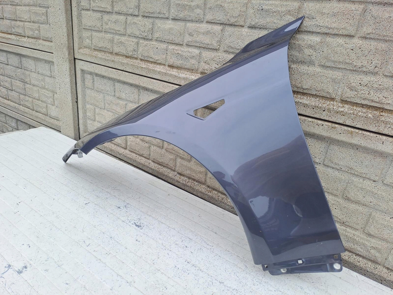 TESLA MODEL S PLAID BŁOTNIK LEWY PRZEDNI - (16153931425)