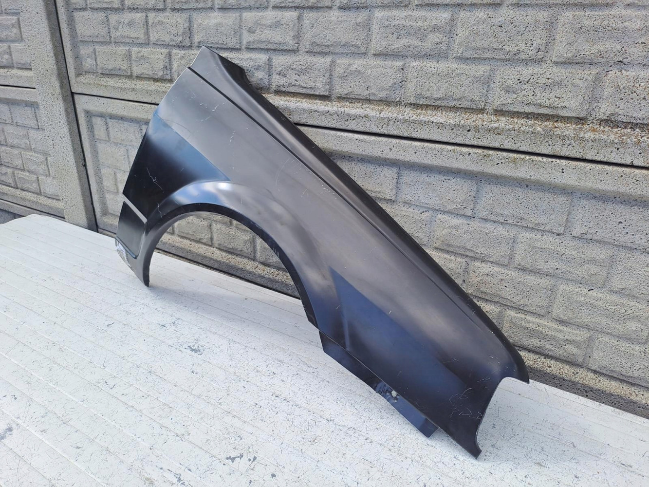 VW POLO 2 II LIFT 1990-94 BŁOTNIK PRZEDNI PRAWY - (16162219902)