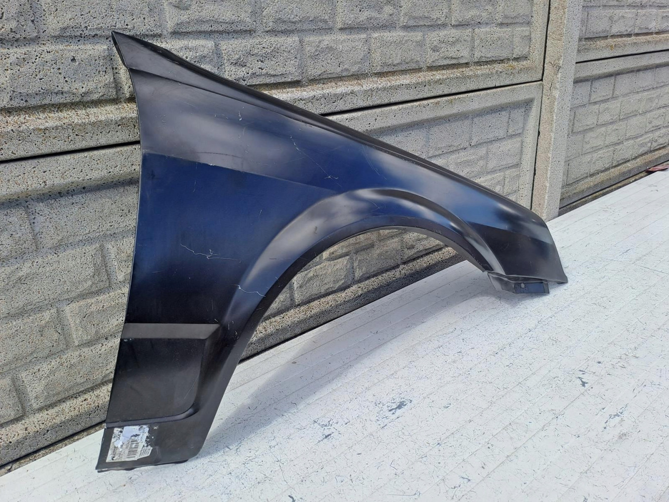 VW POLO 2 II LIFT 1990-94 BŁOTNIK PRZEDNI PRAWY - (16162219902)