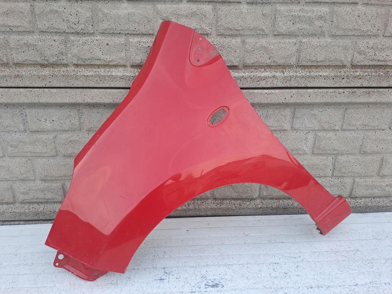 NISSAN PIXO SUZUKI ALTO BŁOTNIK LEWY PRZEDNI - (16177883710)