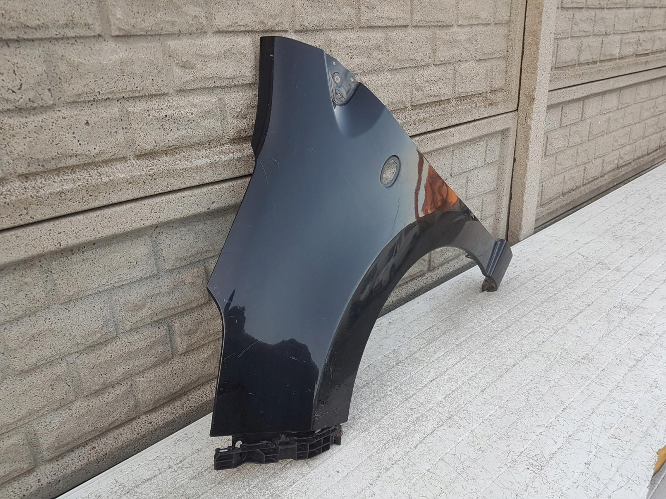 NISSAN PIXO SUZUKI ALTO BŁOTNIK LEWY PRZEDNI - (11973490290)