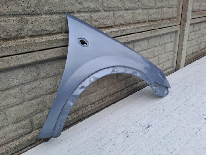 OPEL CORSA C 00-06 BŁOTNIK PRZEDNI PRAWY - (16259497659)