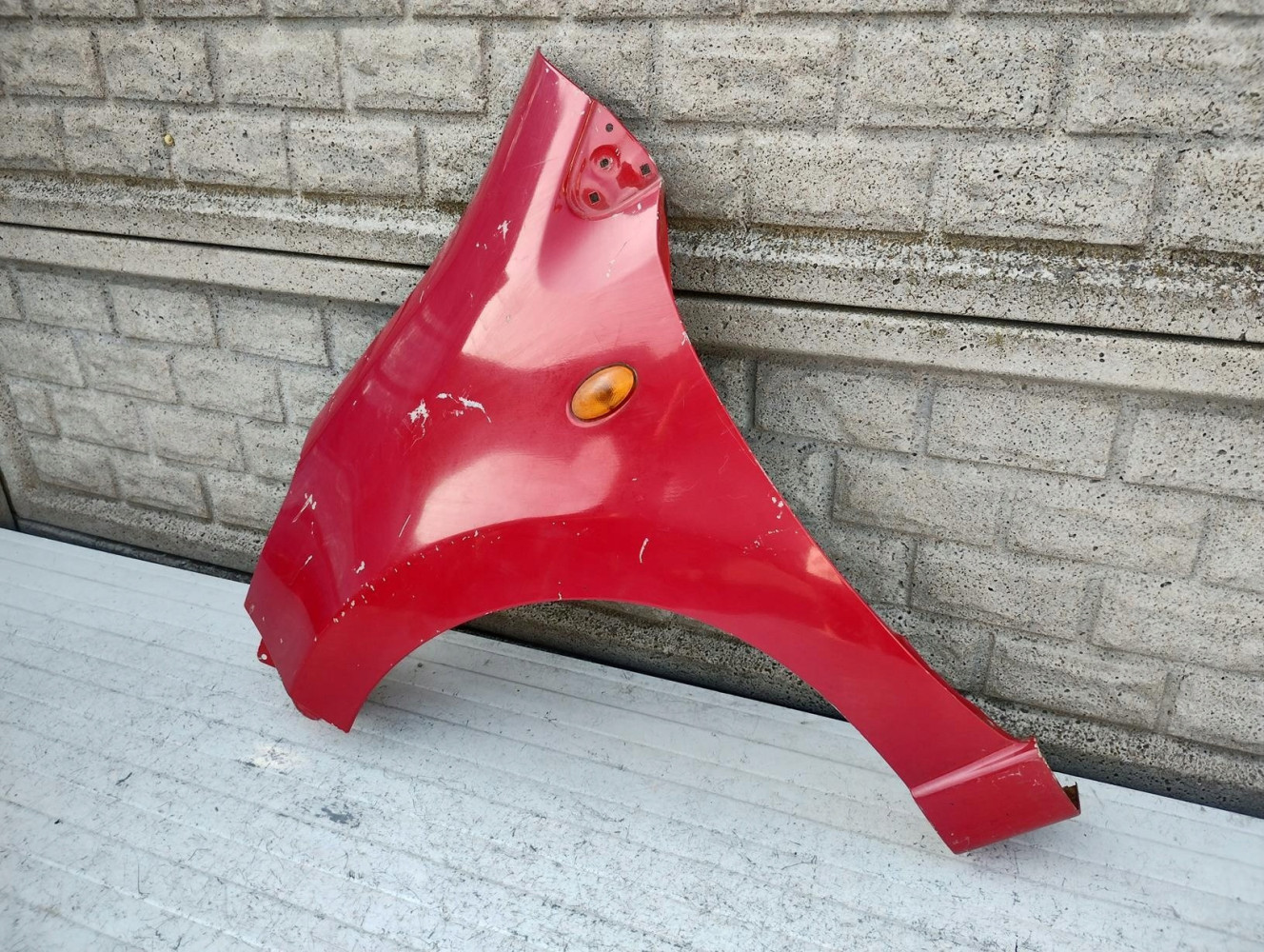 NISSAN PIXO SUZUKI ALTO BŁOTNIK LEWY PRZEDNI - (16415625468)