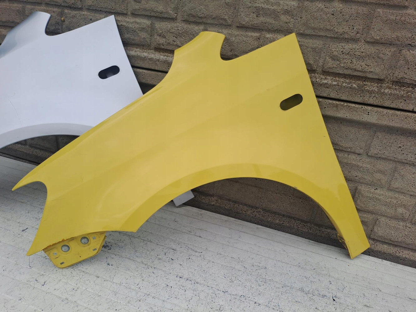 BŁOTNIK LEWY VW CADDY 2010 - 2015 - (16430734415)