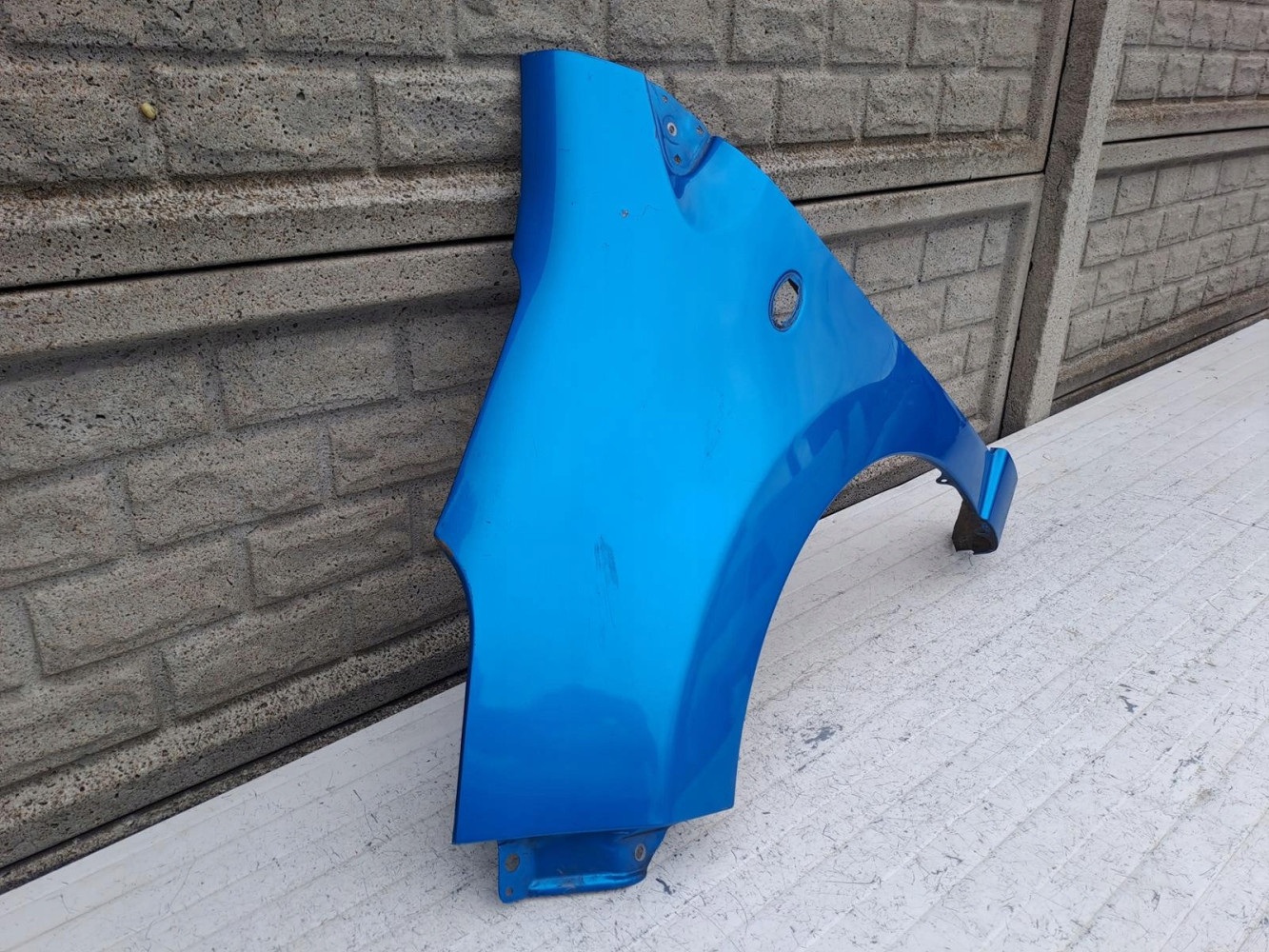 NISSAN PIXO SUZUKI ALTO BŁOTNIK LEWY PRZEDNI - (16478326657)