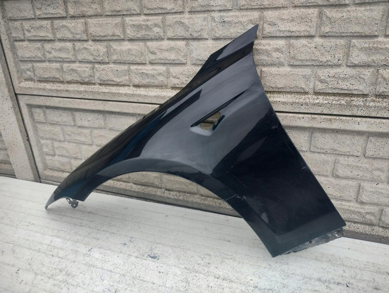 TESLA MODEL S BŁOTNIK LEWY PRZEDNI - (16607738467)