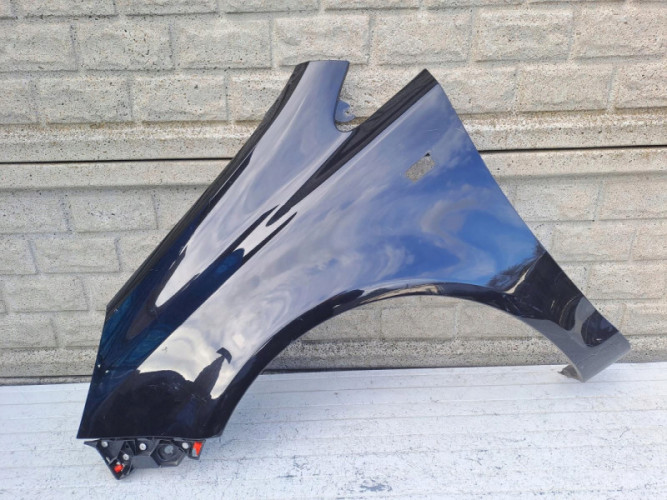 BŁOTNIK LEWY OPEL CORSA D 2006-2015 - (16696772932)