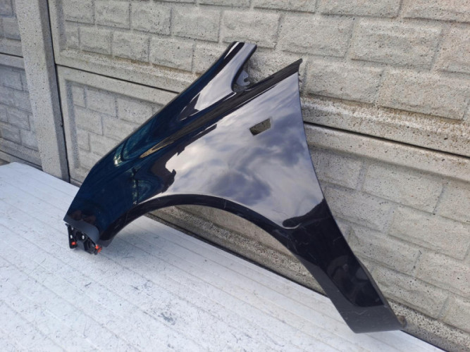 BŁOTNIK LEWY OPEL CORSA D 2006-2015 - (16696772932)