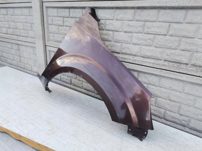 NISSAN NAVARA IV 16-20 BŁOTNIK PRZEDNI PRAWY - (12136160234)