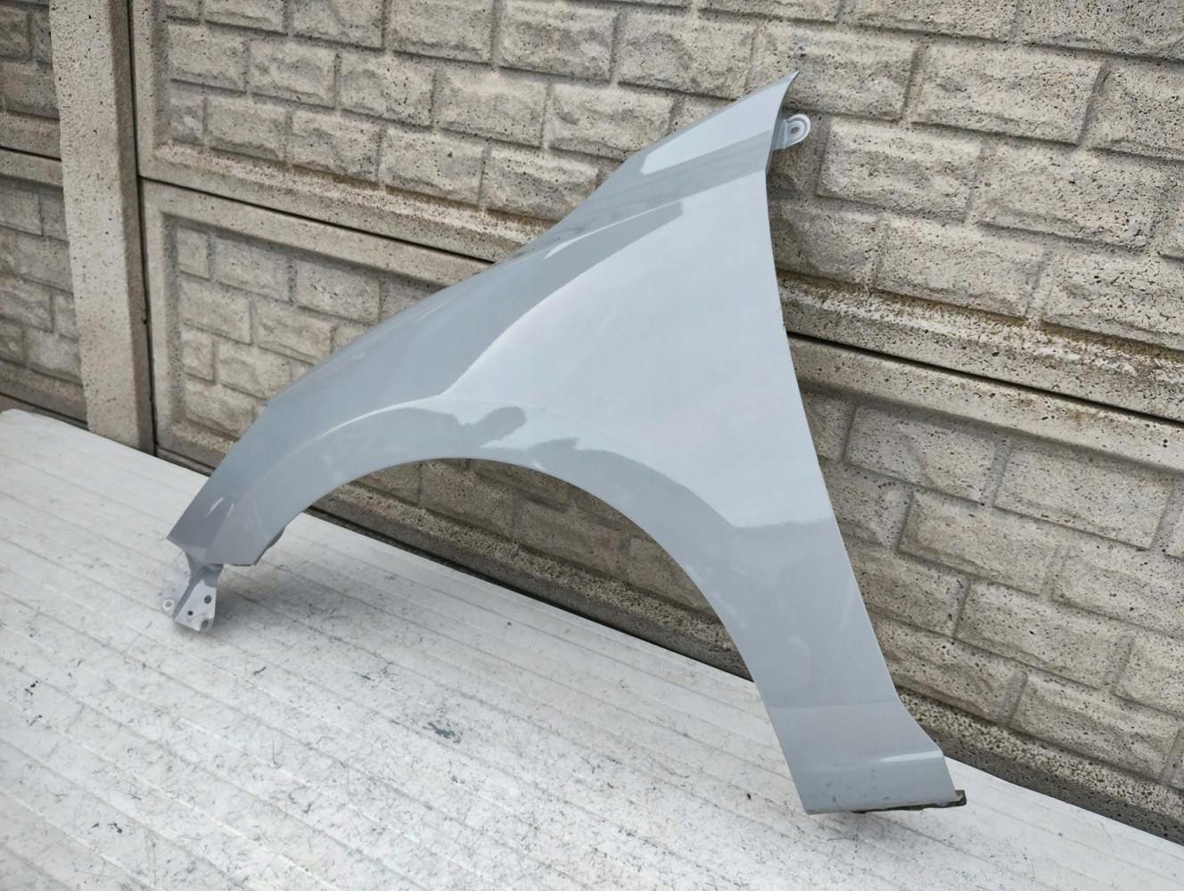 MAZDA 2 II 2015-2022 BŁOTNIK LEWY PRZEDNI - (16730329713)