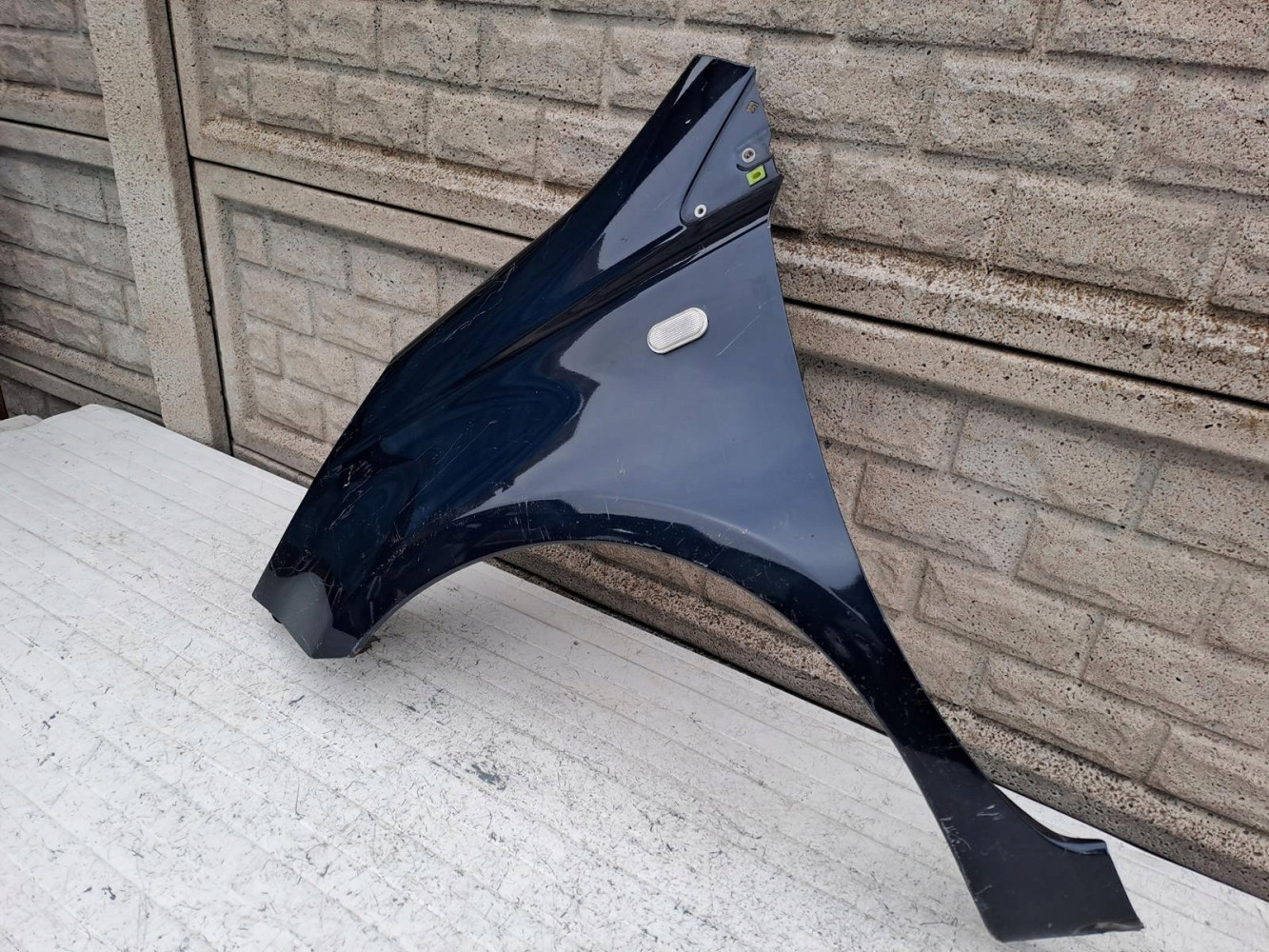 NISSAN NOTE 2006 - 2012 BŁOTNIK PRZEDNI LEWY - (16737396938)