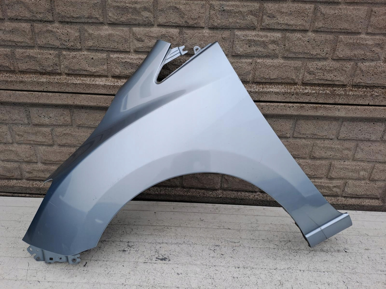 MAZDA 5 V 10-18 BŁOTNIK PRZEDNI LEWY - (16743514009)