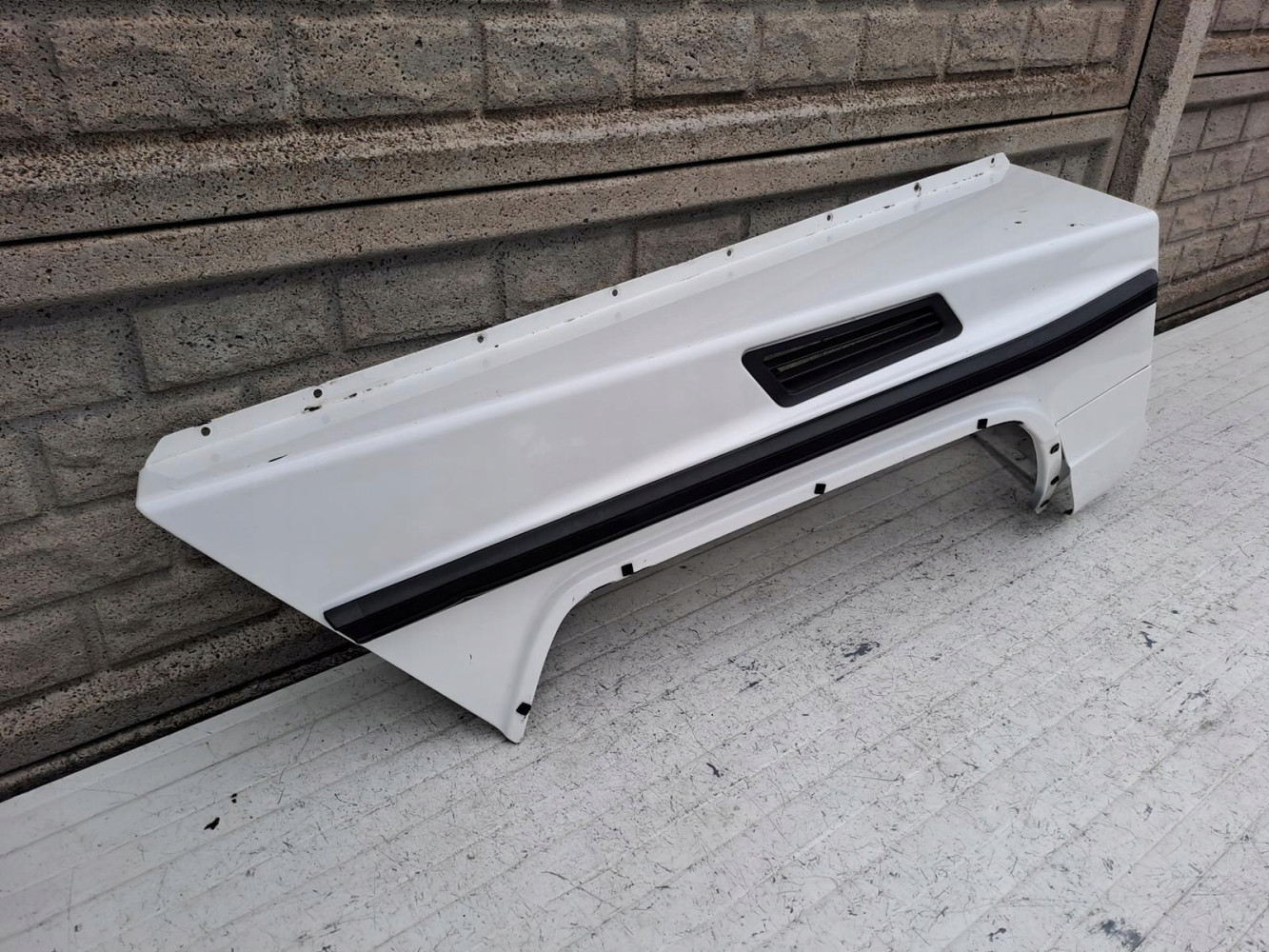 MERCEDES G KLASA W463 BŁOTNIK PRAWY PRZEDNI - (16743573557)