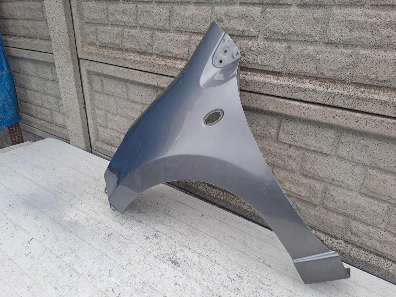 NISSAN PIXO SUZUKI ALTO BŁOTNIK LEWY PRZEDNI - (16779133833)