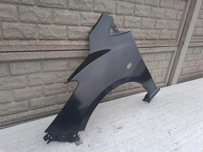 MAZDA 2 II 2007-2015 BŁOTNIK LEWY PRZEDNI - (16808744853)