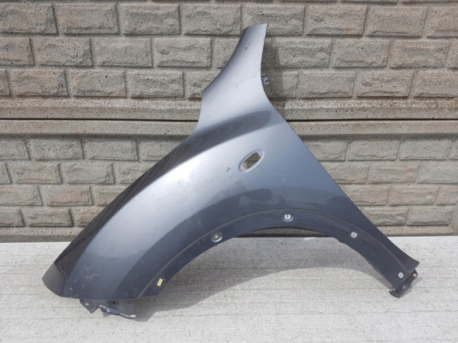 NISSAN JUKE 10-15 BŁOTNIK PRZEDNI LEWY - (12152757133)