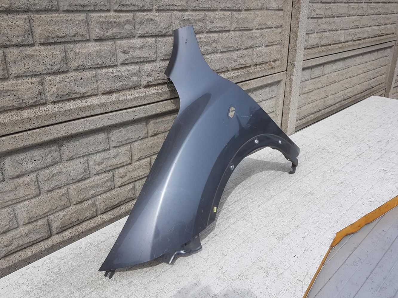NISSAN JUKE 10-15 BŁOTNIK PRZEDNI LEWY - (12152757133)