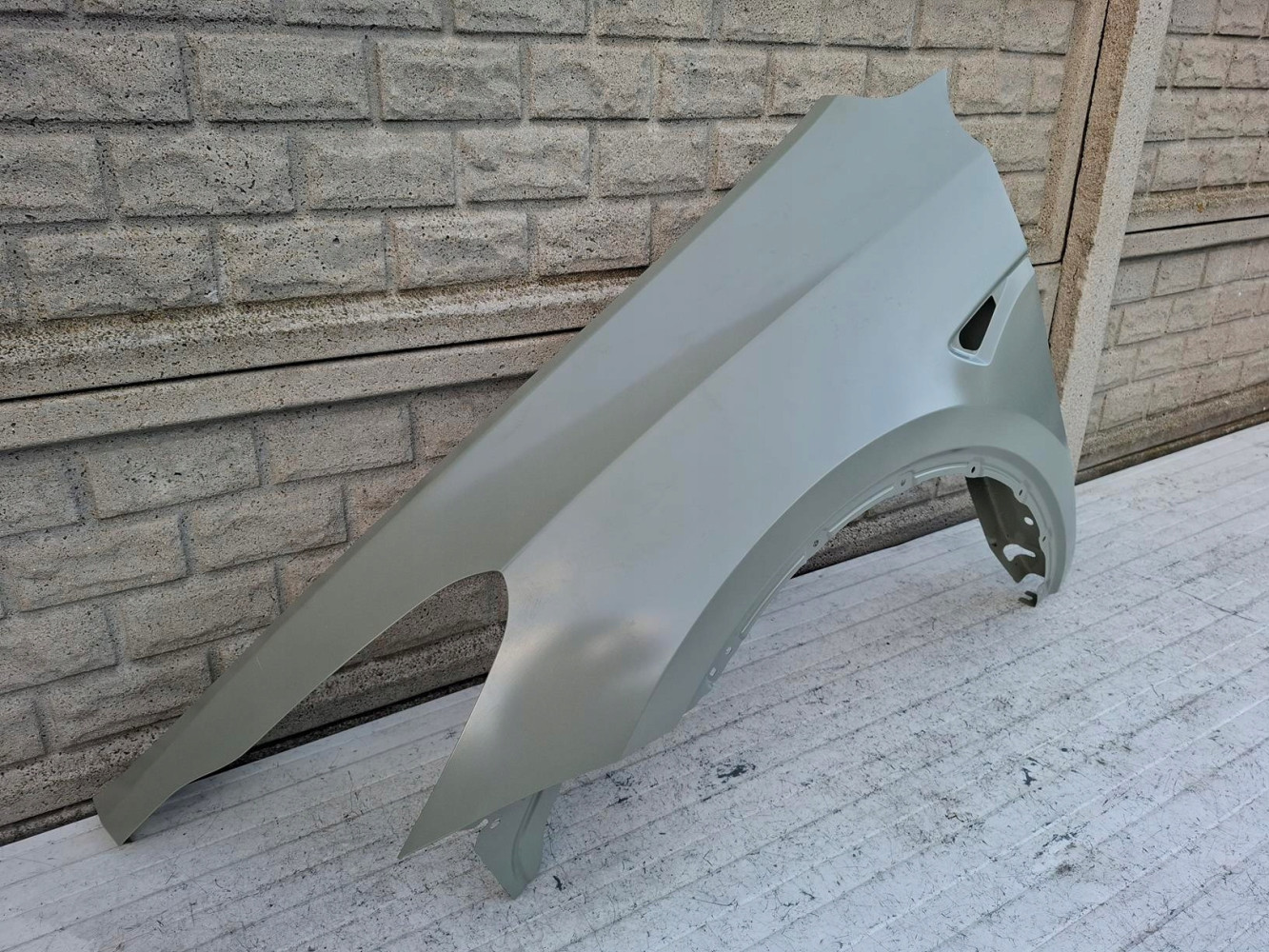 TESLA Y MODEL Y BŁOTNIK PRZEDNI LEWY NOWY - (16925764410)