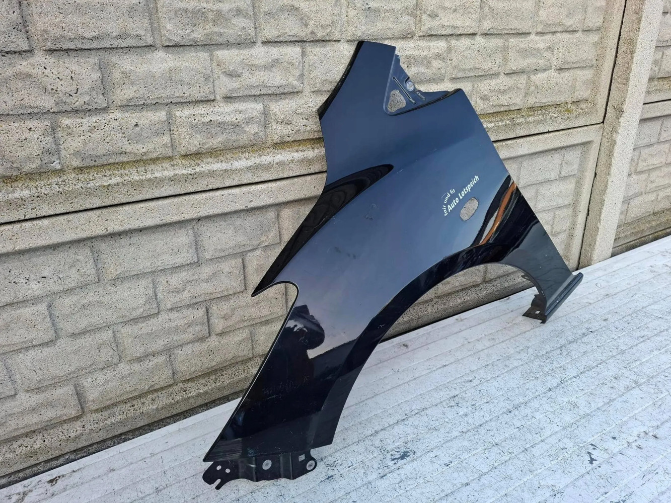 BŁOTNIK PRZEDNI LEWY MAZDA 2 II 2007-14 - (16973318510)