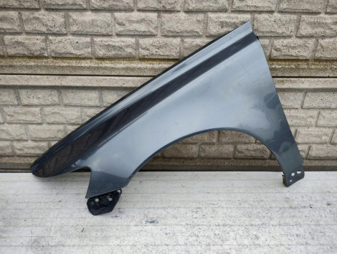 VOLVO S40 V50 04-12 BLOTNIK PRZEDNI LEWY - (16984554019)