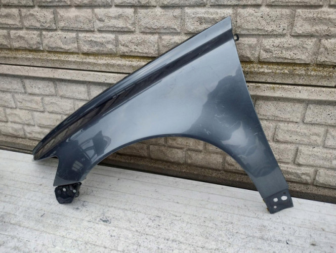 VOLVO S40 V50 04-12 BLOTNIK PRZEDNI LEWY - (16984554019)