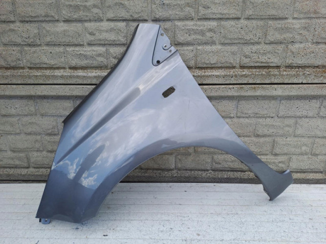 NISSAN NOTE 2006 - 2012 BŁOTNIK PRZEDNI LEWY - (17090011412)