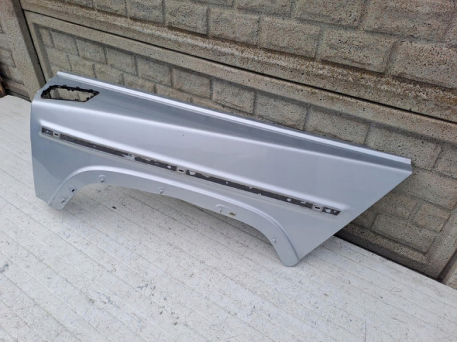 MERCEDES G KLASA W463 W464 BŁOTNIK LEWY PRZEDNI - (17130631536)