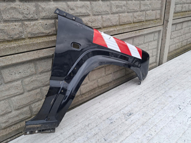 BŁOTNIK PRAWY PRZEDNI SUZUKI JIMNY 18-24 - (17133013851)