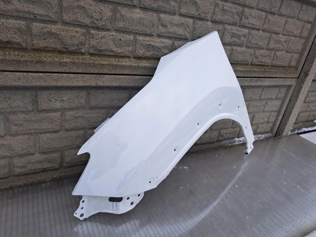 BŁOTNIK LEWY PRZEDNI TOYOTA YARIS CROSS 19-24 - (17133107935)
