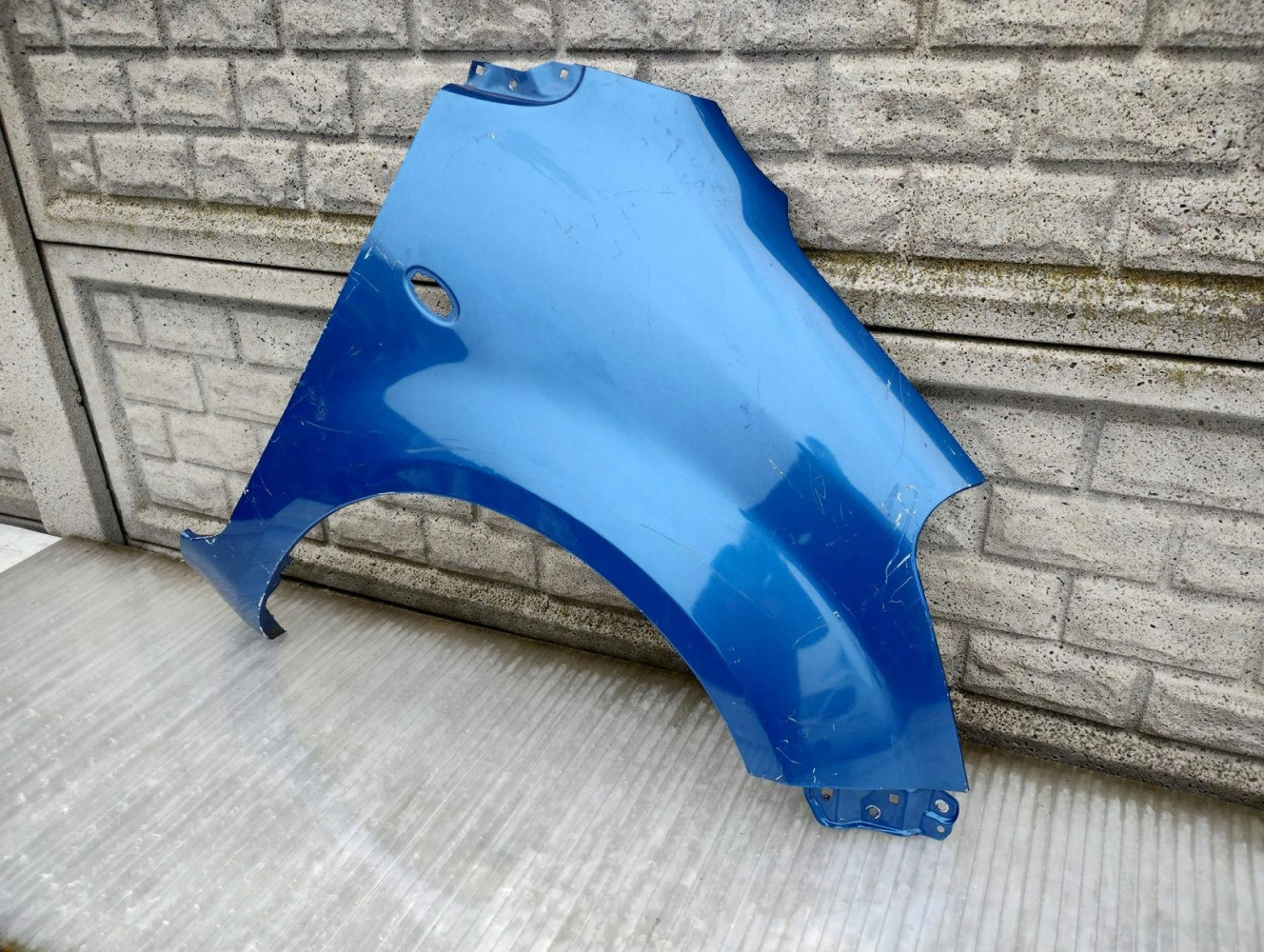SUZUKI SPLASH 2007-2017 BŁOTNIK PRZEDNI PRAWY - (17148639033)